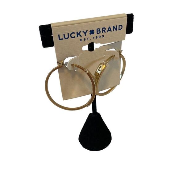 Embossed “Lucky” Gold Toned Hoops - Picture 2 of 6